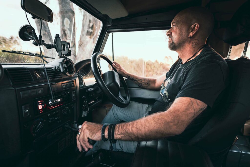 Not your average Joe, men's life coach and mentor, driving his Landrover